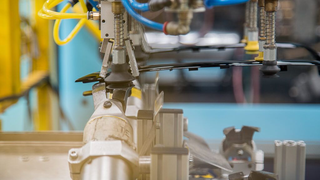 Detalle de máquina en producción, fotografía industrial en Valencia